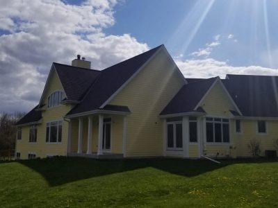 Yellow and white painted house in milwaukee