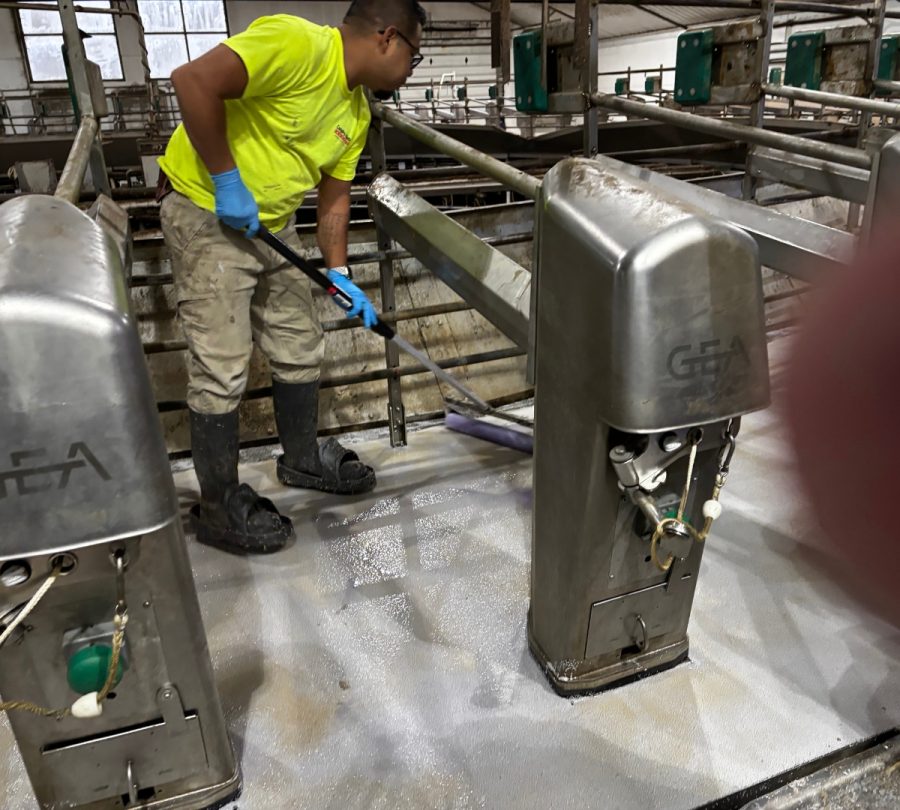 Gill Dairy Case Study floor being smoothed behind equipment Preview Image 1