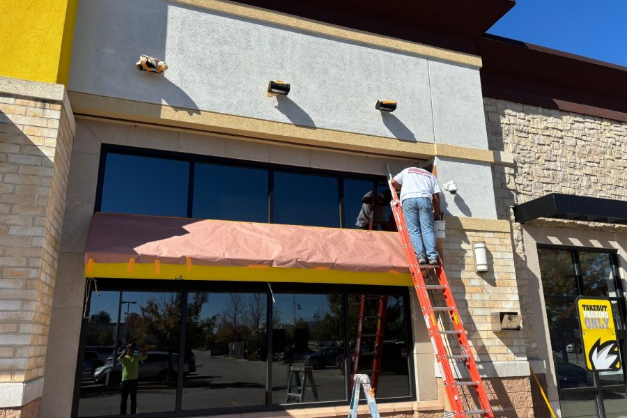 Retail Shops Case Study during photo man working on ladder Preview Image 10