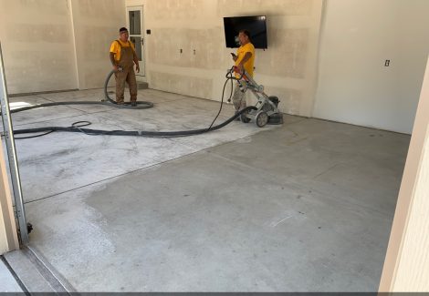 Certa Pro team working on garage floor