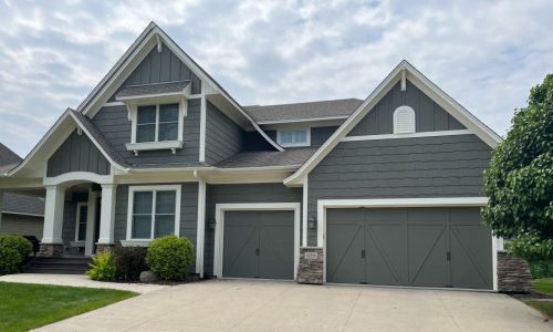 View of repainted house in Plymouth from the front, after painting
