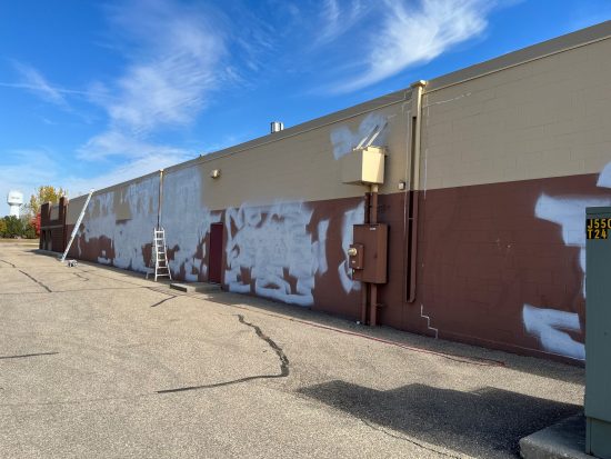 damaged exterior walls before repainting