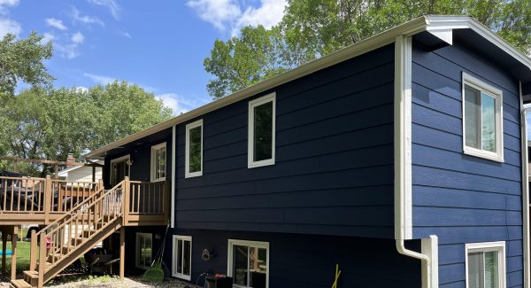 Home With Large Garage in Plymouth - Back porch view of house after painting