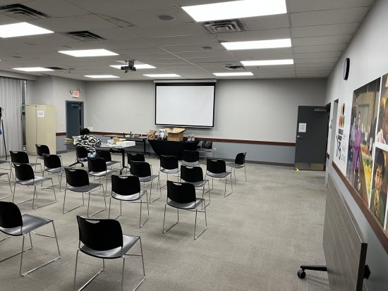 new painted meeting room with black chairs at The Food Group in New Hope MN