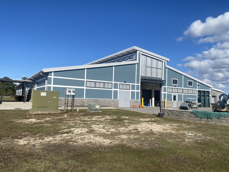 street view photo of blue building after blue paint project Preview Image 10