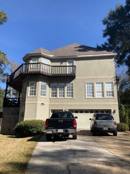 house with stucco exterior before repaint Preview Image 2