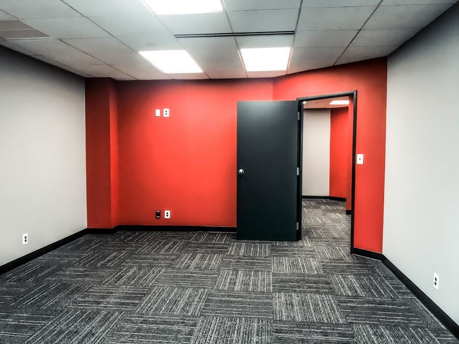 Office complex red wall and black door after completed painting project by CertaPro Mount Laurel Preview Image 1