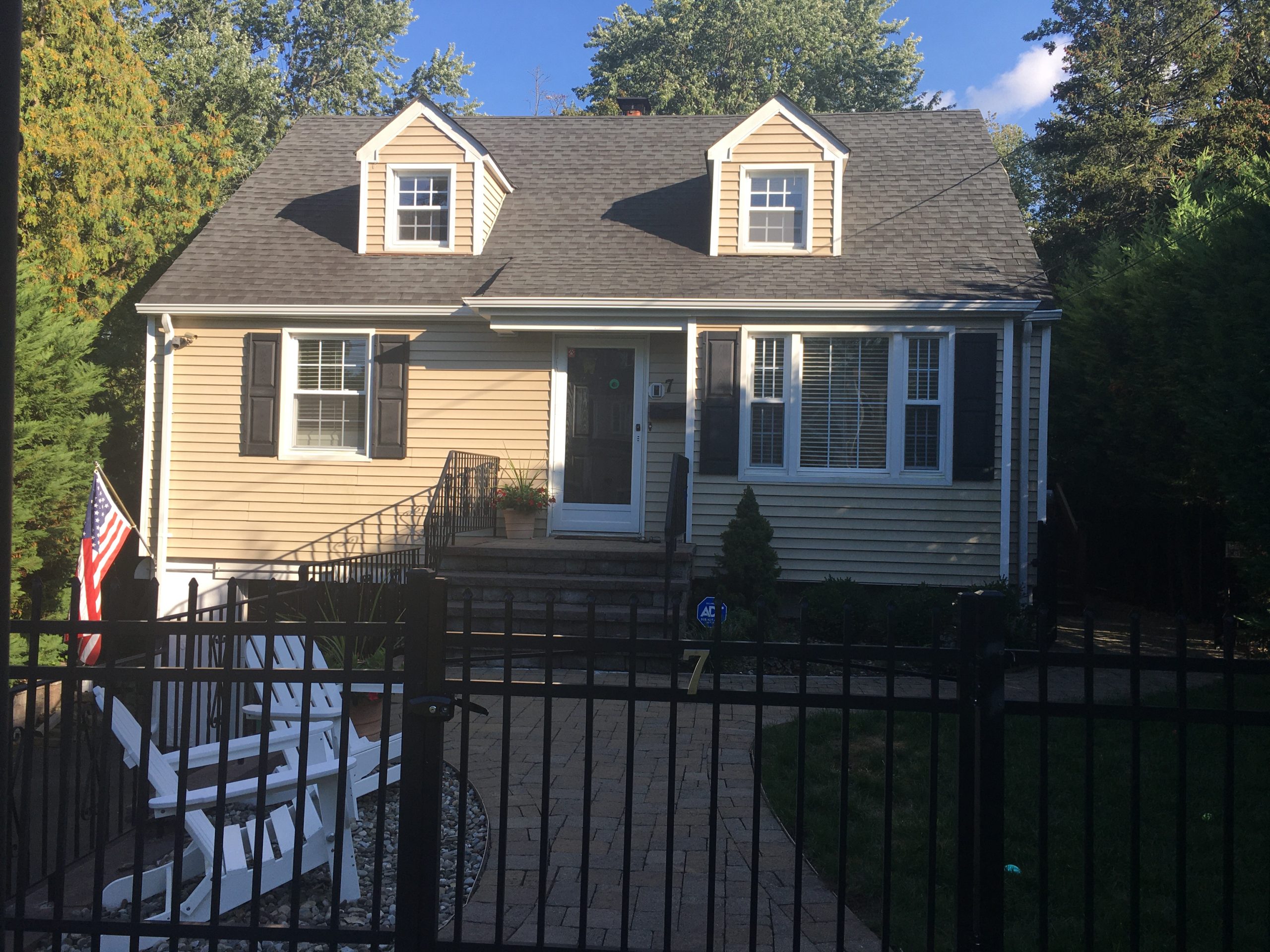 Cape Cod style home in Watchung, NJ before being repainted.