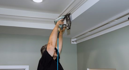 Crown molding installation in process