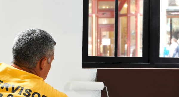 CertaPro painter interior painting a commercial space