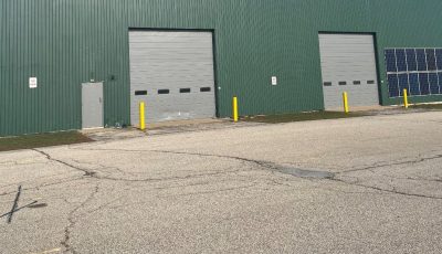 Green Steel Builing Professionally Painted Manchester, NH