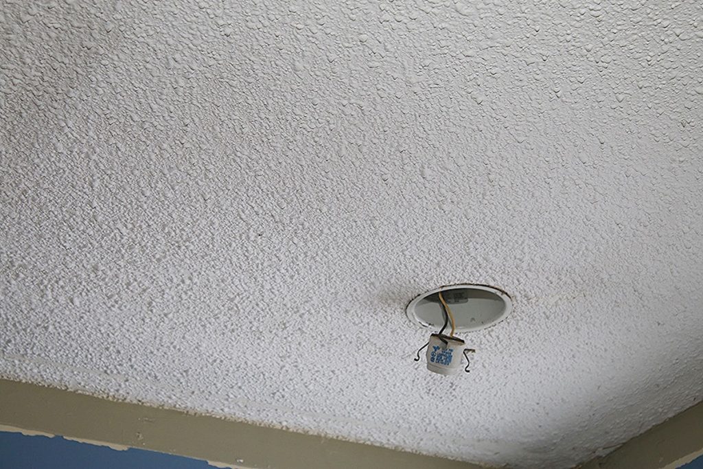 popcorn ceiling before