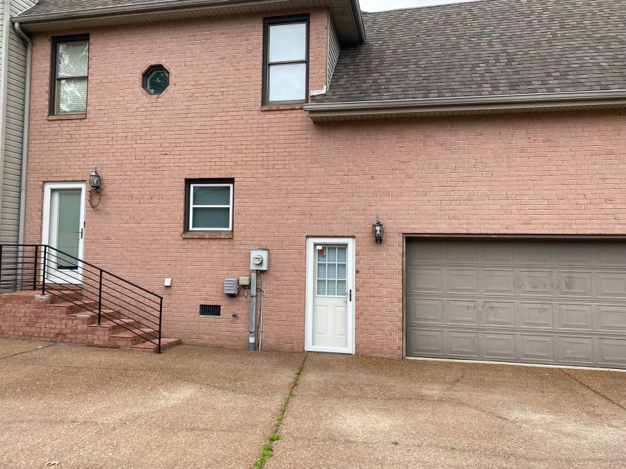 Side of brick home (before) Preview Image 2