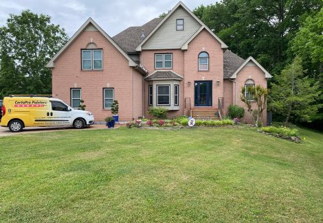 Front of brick home (before)