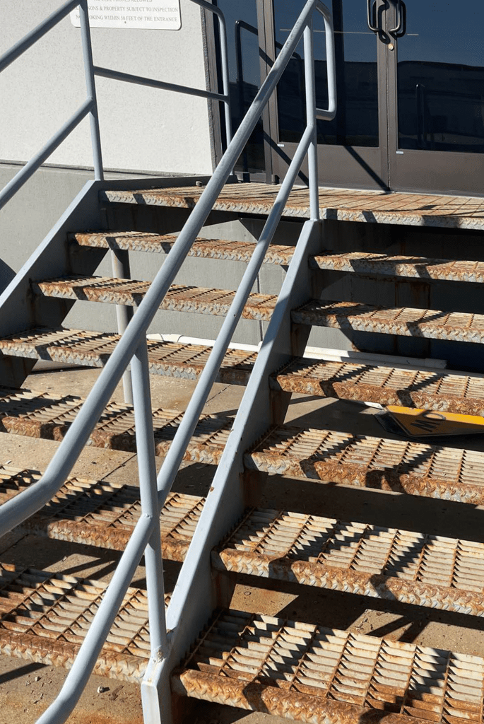Rusted Metal Stairway Restored After