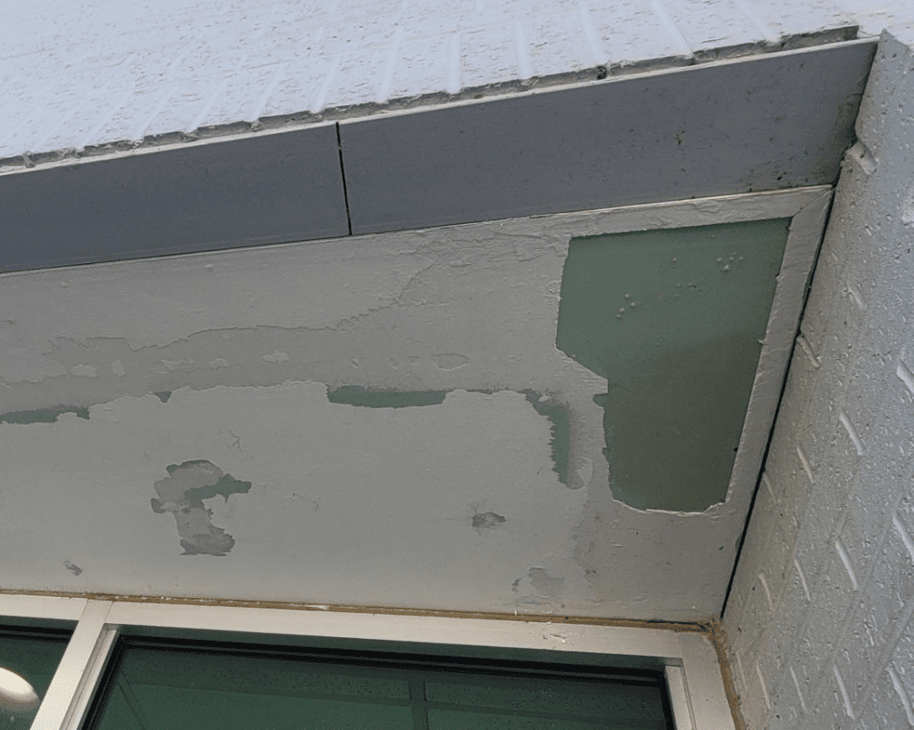 Exterior Drywall Repair for Car Dealership Before