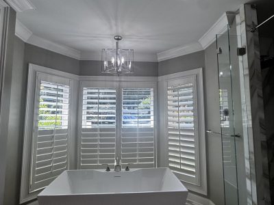 soaking tub in painted bathroom
