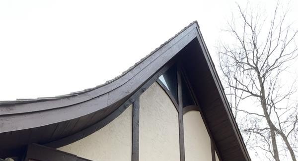 after repairing carpenter bee damage and repainting fascia and soffits