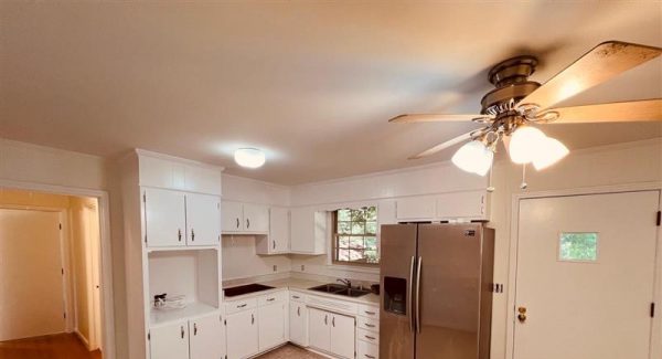 kitchen with white painted cabinets