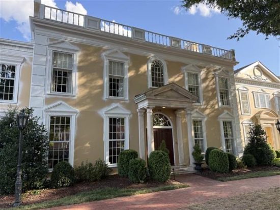 stucco building during exterior repaint
