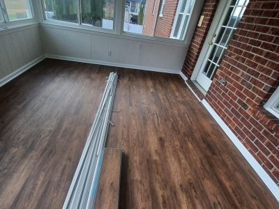sunroom with wooden floor
