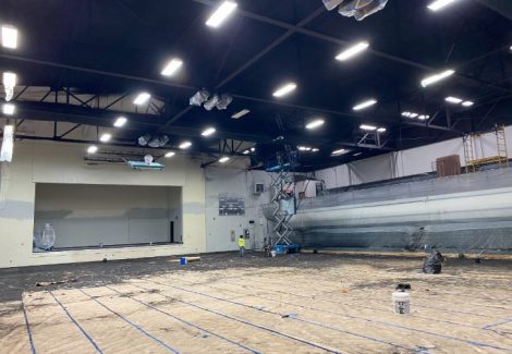 painters working in gymnasium