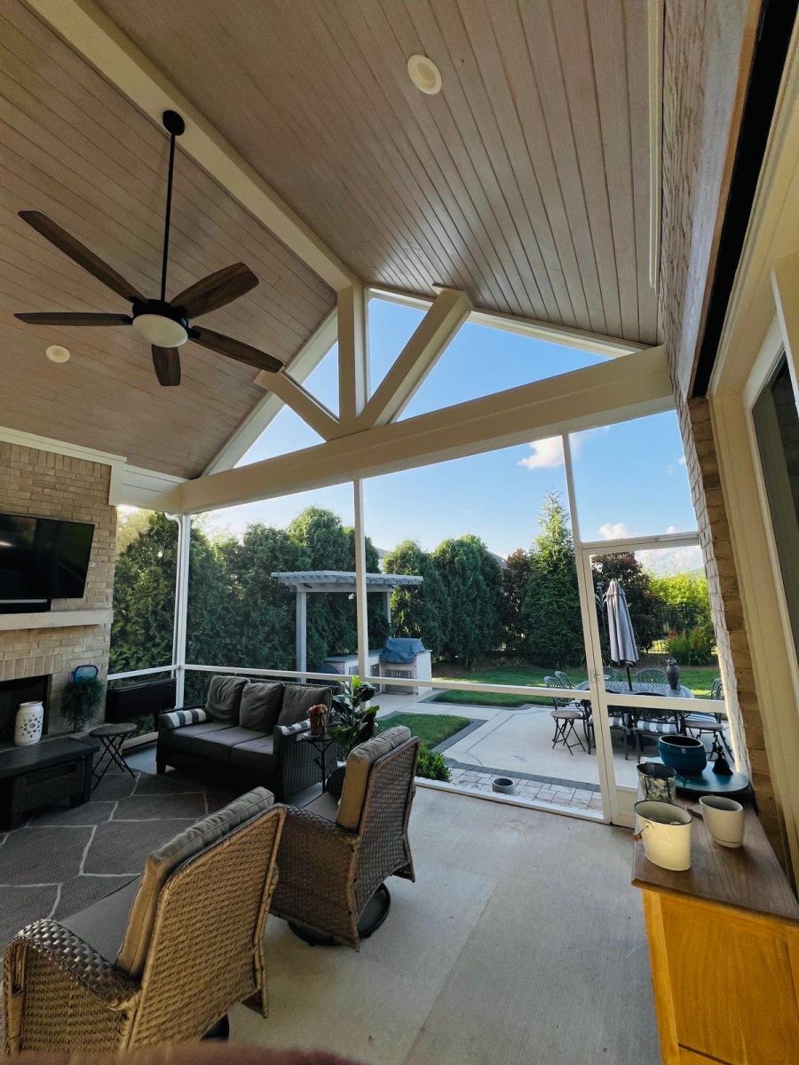 interior of sunroom with high ceiling and fan Preview Image 7