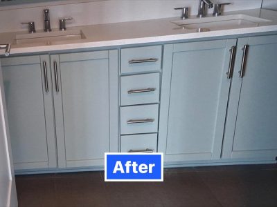 light blue painted bathroom cabinet