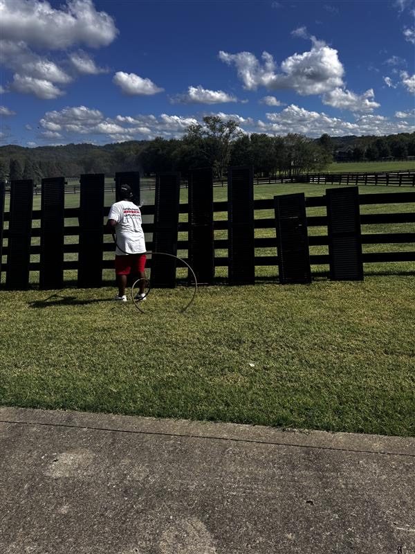 painted shutters drying against fence Preview Image 7