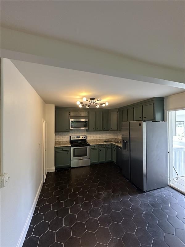 kitchen with green painted cabinets Preview Image 2
