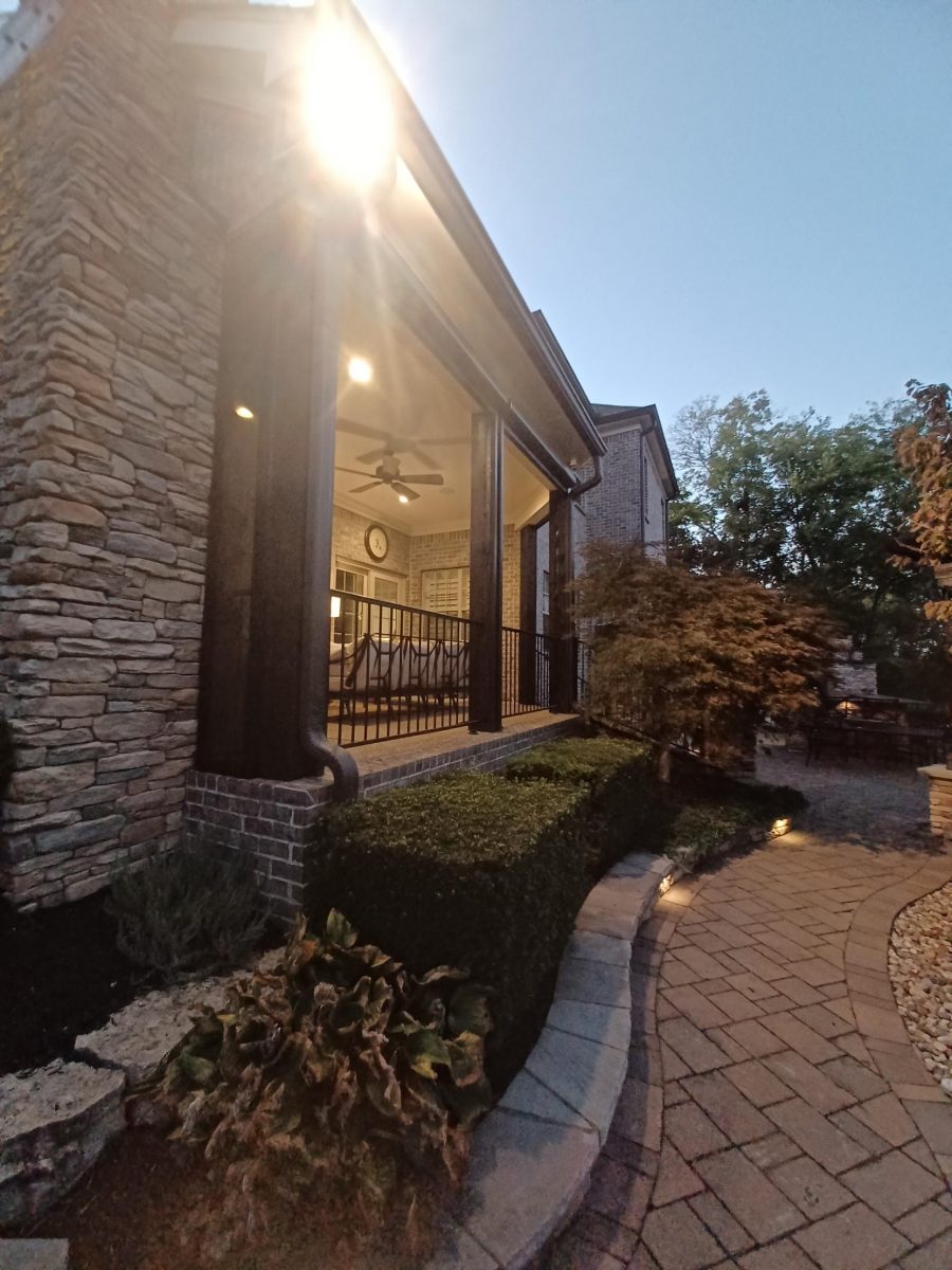 brick home with painted trim and shutters Preview Image 3