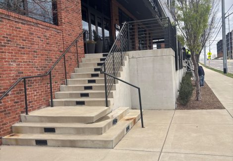 steps outside commercial building