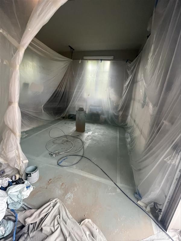 kitchen fulling covered in plastic sheeting during repaint Preview Image 12