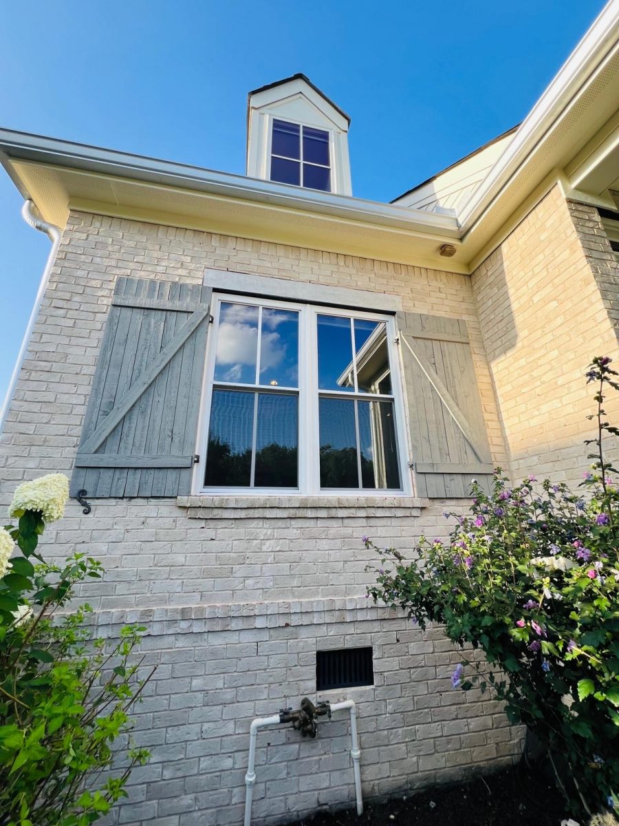 window on house with wooden barn shutters Preview Image 5