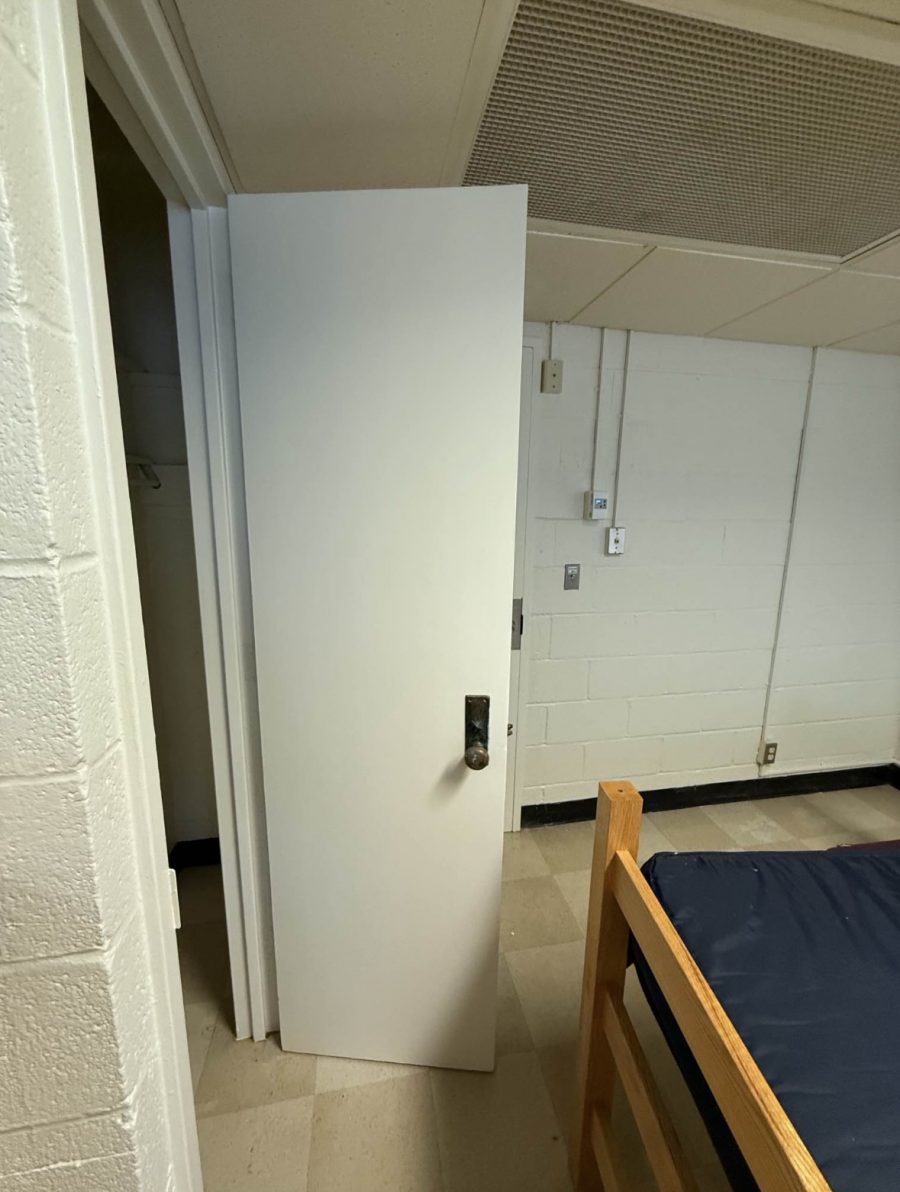 repainted dorm room with furniture pushed to center of room Preview Image 4