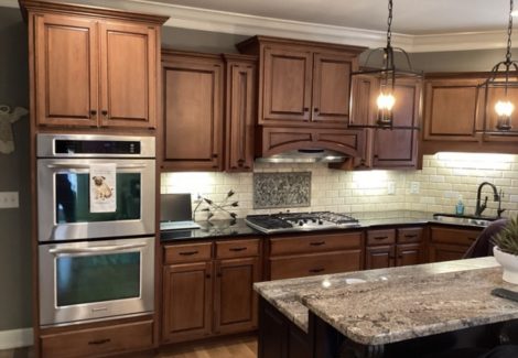 kitchen with stained wooden cabinets