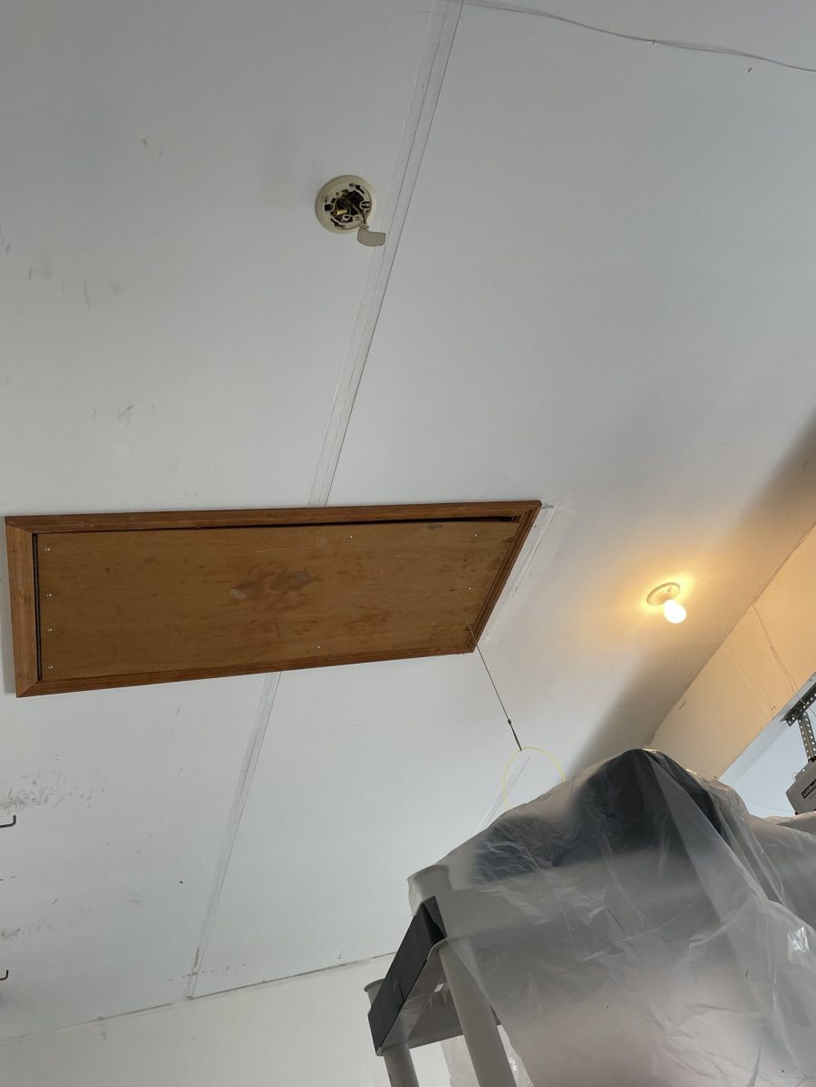 attic access door in garage ceiling with drywall seam Preview Image 1
