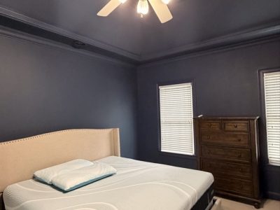 bedroom with color drench painting