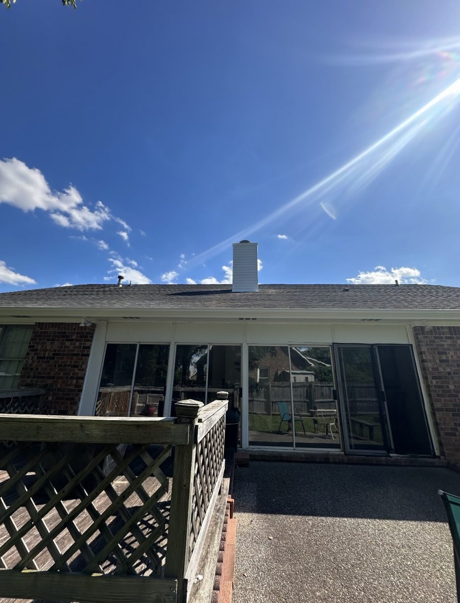 brick house with worn paint on trim Preview Image 5