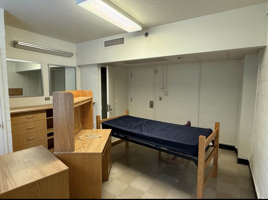 repainted dorm room with furniture pushed to center of room Preview Image 5