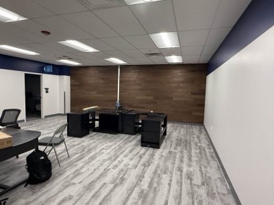 office space interior with faux wood wall