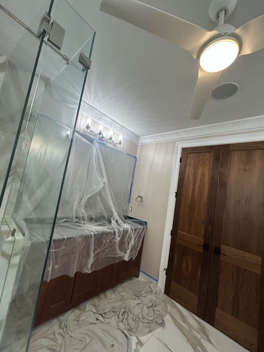 bathroom vanity with protective plastic covering before painting Preview Image 3