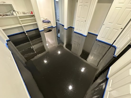 black epoxy floor during install