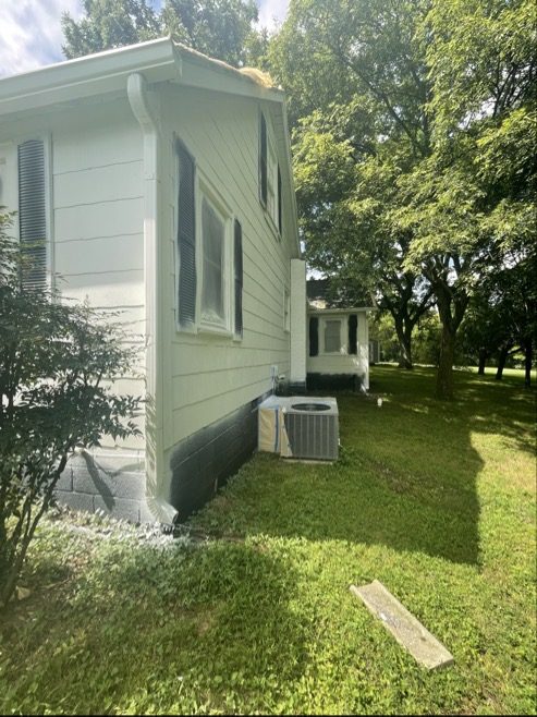 side of white house during repaint Preview Image 9