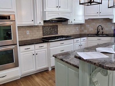 kitchen with white painted cabinets