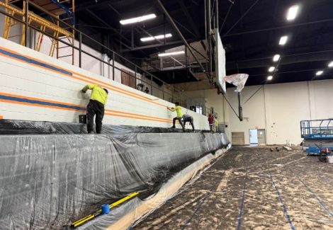 painters working on gym walls