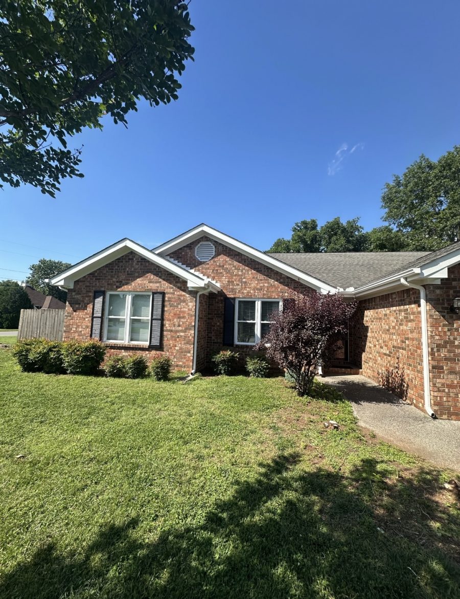 brick house with painted trim Preview Image 1