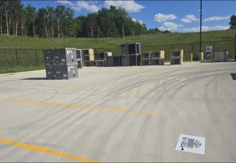 loading area lot with fresh painted striping and hvac equipment