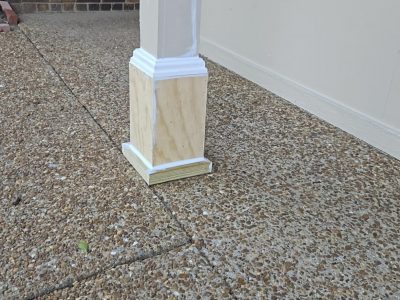 wooden post with repaired wood base