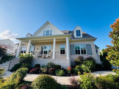 brick house with steps to front door